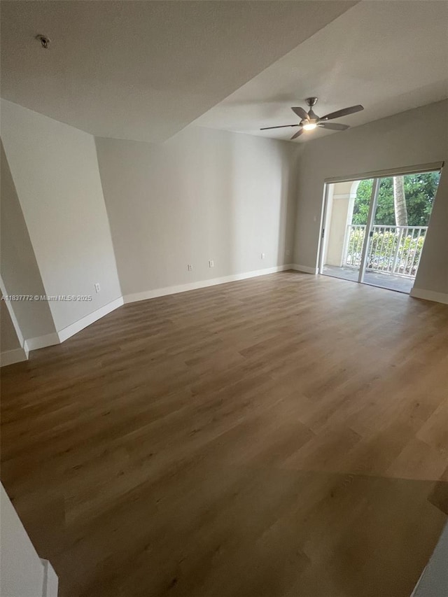 11605 NW 89th St Unit 112, Doral, FL 33178 - spare room with ceiling fan, wood finished floors, and fire sprinkler in ceiling