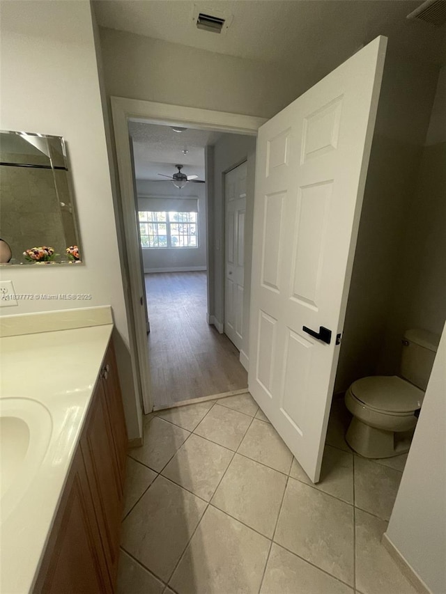 11605 NW 89th St Unit 112, Doral, FL 33178 - full bathroom with vanity, tile patterned floors, and ceiling fan