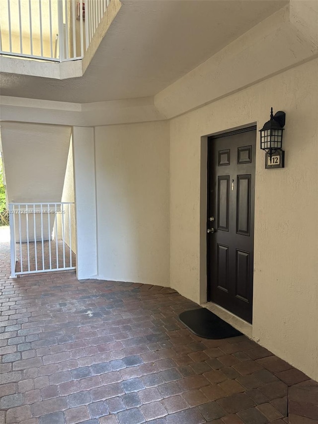 11605 NW 89th St Unit 112, Doral, FL 33178 - property entrance featuring stucco siding
