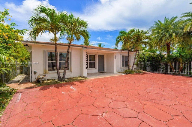2761 SW 33rd Ct, Miami, FL 33133 - back of house with a patio and stucco siding