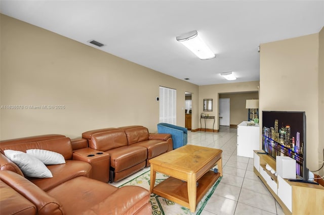 2761 SW 33rd Ct, Miami, FL 33133 - living area featuring light tile patterned floors and baseboards