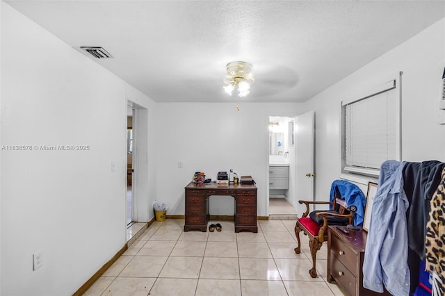 2761 SW 33rd Ct, Miami, FL 33133 - office featuring ceiling fan, light tile patterned floors, and a textured ceiling