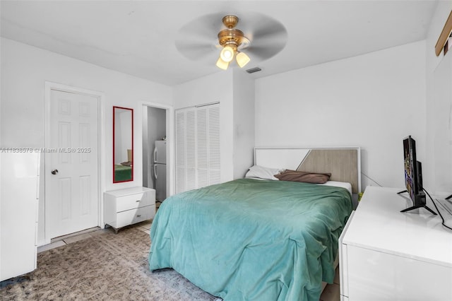 2761 SW 33rd Ct, Miami, FL 33133 - bedroom featuring freestanding refrigerator, tile patterned flooring, and ceiling fan