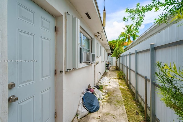 2761 SW 33rd Ct, Miami, FL 33133 - view of side of home featuring stucco siding and cooling unit