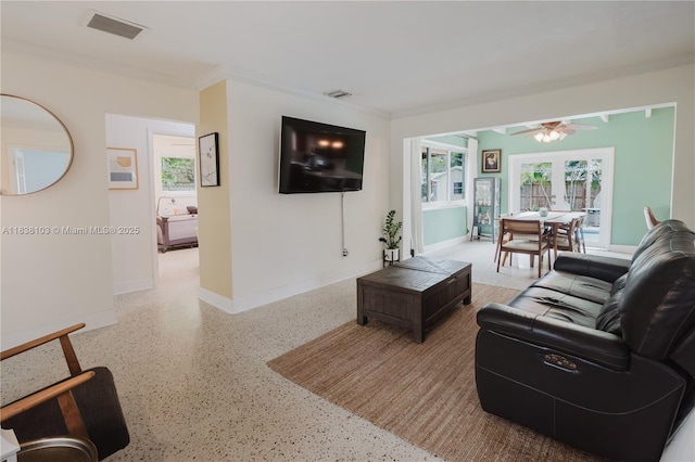 1112 N 31st Ave, Hollywood, FL 33021 - living room with speckled floor, a ceiling fan, and crown molding