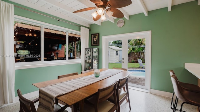 1112 N 31st Ave, Hollywood, FL 33021 - dining area featuring speckle patterned floor, beam ceiling, a ceiling fan, and french doors