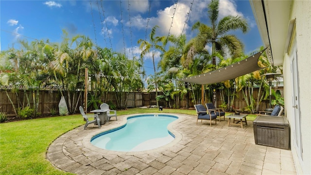 1112 N 31st Ave, Hollywood, FL 33021 - view of swimming pool featuring a patio area and a fenced backyard