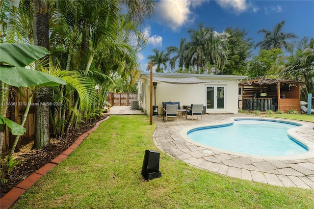 1112 N 31st Ave, Hollywood, FL 33021 - view of swimming pool with a fenced backyard and a patio