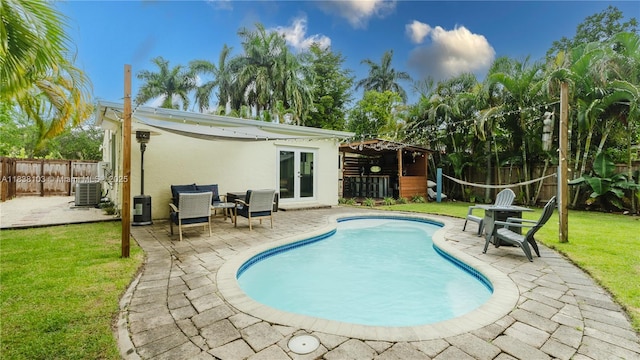 1112 N 31st Ave, Hollywood, FL 33021 - view of pool featuring a fenced backyard, a patio area, a gazebo, and french doors