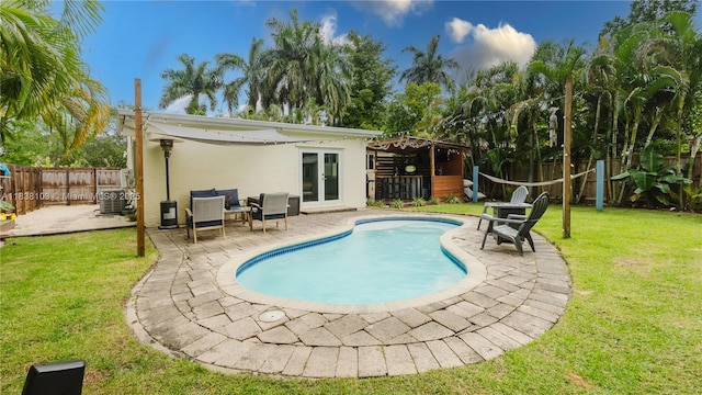 1112 N 31st Ave, Hollywood, FL 33021 - view of swimming pool with a fenced backyard, a patio, and french doors