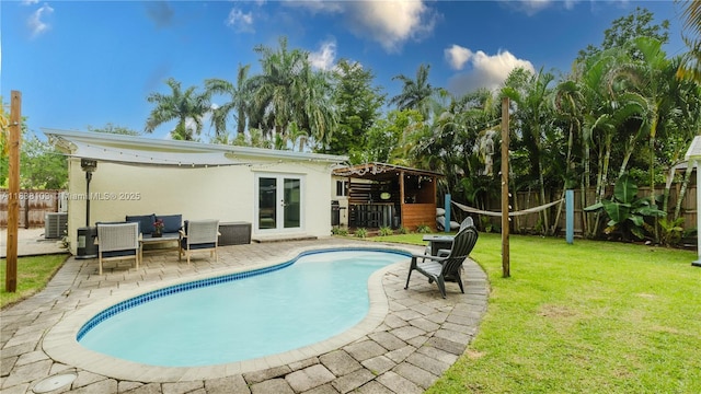 1112 N 31st Ave, Hollywood, FL 33021 - view of pool with french doors, a fenced backyard, and a patio