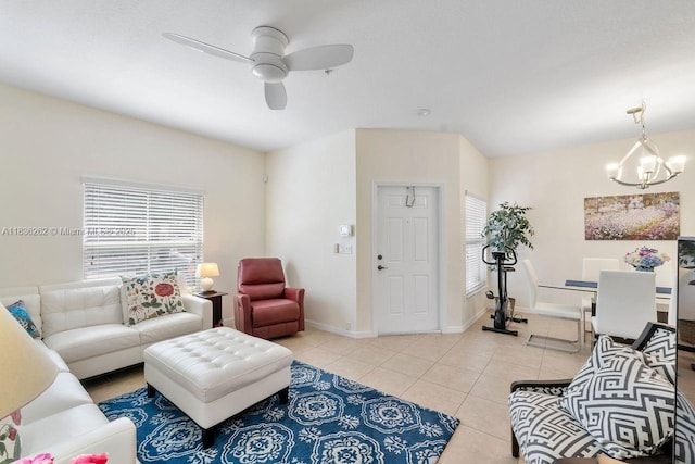 2851 W Prospect Rd Unit 1306, Tamarac, FL 33309 - living room with plenty of natural light, a chandelier, a ceiling fan, and light tile patterned flooring