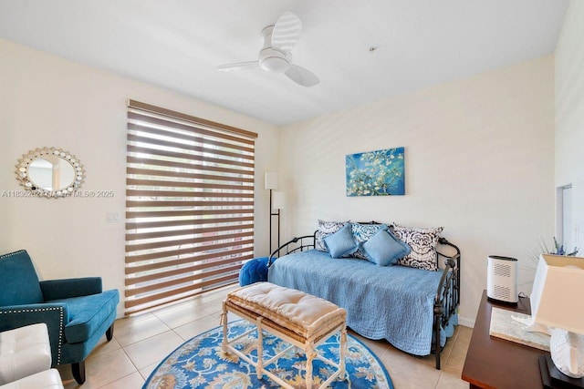 2851 W Prospect Rd Unit 1306, Tamarac, FL 33309 - bedroom featuring light tile patterned floors and a ceiling fan