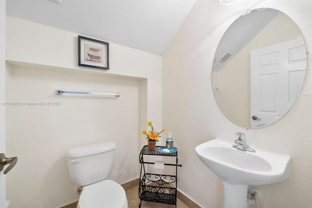2851 W Prospect Rd Unit 1306, Tamarac, FL 33309 - half bathroom with toilet and a sink