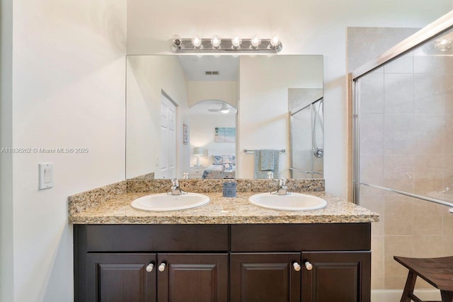 2851 W Prospect Rd Unit 1306, Tamarac, FL 33309 - ensuite bathroom with double vanity and a shower stall