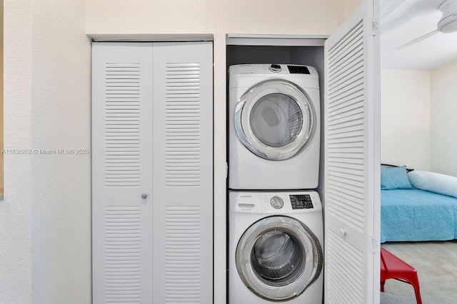 2851 W Prospect Rd Unit 1306, Tamarac, FL 33309 - laundry room featuring estacked washer and dryer and carpet