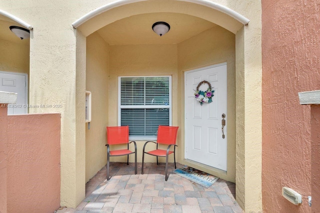 2851 W Prospect Rd Unit 1306, Tamarac, FL 33309 - view of exterior entry with stucco siding