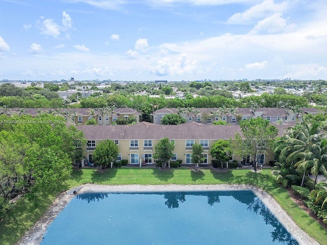 2851 W Prospect Rd Unit 1306, Tamarac, FL 33309 - view of swimming pool featuring a yard