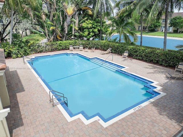 2851 W Prospect Rd Unit 1306, Tamarac, FL 33309 - community pool with a patio