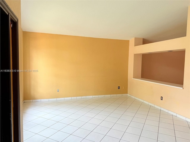 8973 NW 147th Ter, Miami Lakes, FL 33018 - unfurnished room featuring light tile patterned flooring