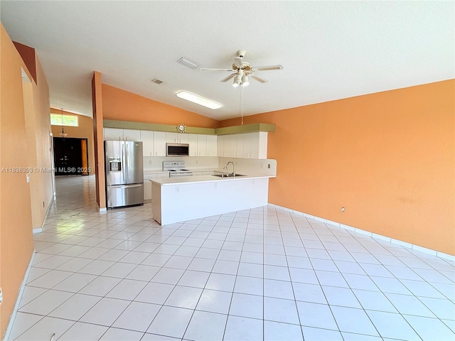 8973 NW 147th Ter, Miami Lakes, FL 33018 - kitchen with appliances with stainless steel finishes, lofted ceiling, ceiling fan, a peninsula, and light countertops