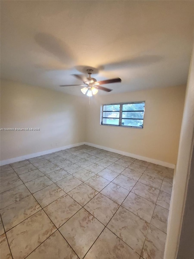 1450 NE 191st St Unit 106, Miami, FL 33179 - spare room featuring ceiling fan and light tile patterned floors