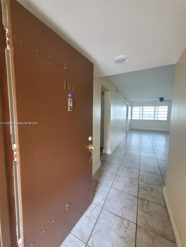 1450 NE 191st St Unit 106, Miami, FL 33179 - hall with baseboards