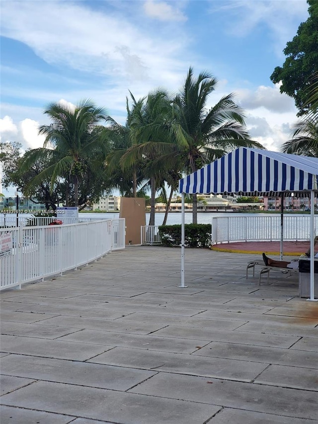 1450 NE 191st St Unit 106, Miami, FL 33179 - view of wooden deck