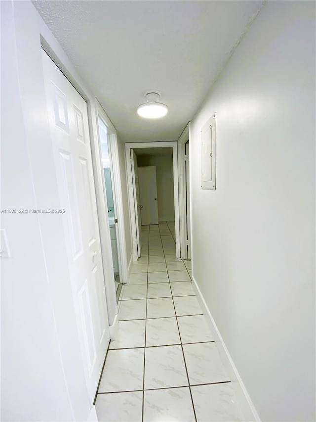 5705 W 20th Ave Unit 115, Hialeah, FL 33012 - corridor with electric panel and baseboards