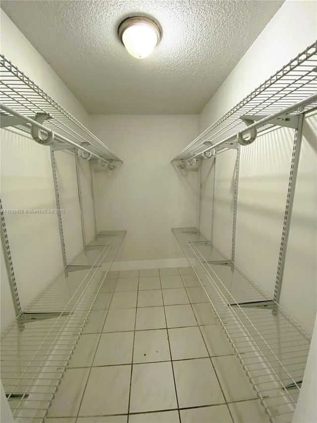 5705 W 20th Ave Unit 115, Hialeah, FL 33012 - walk in closet with tile patterned floors