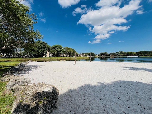 10670 SW 156th Pl Unit 304, Miami, FL 33196 - view of property's community with a water view and volleyball court