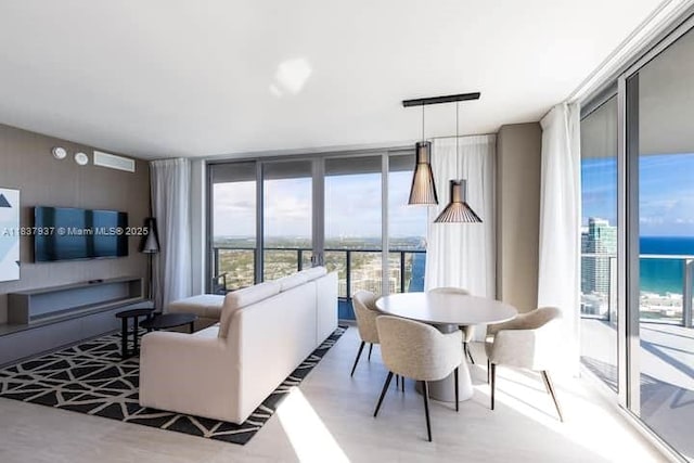 4010 S Ocean Dr Unit T3501, Hollywood, FL 33019 - living area featuring expansive windows and a water view