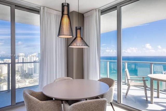 4010 S Ocean Dr Unit T3501, Hollywood, FL 33019 - dining area featuring a wall of windows and a water view