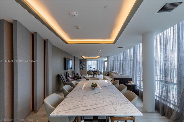 4010 S Ocean Dr Unit R409, Hollywood, FL 33019 - dining room featuring a tray ceiling