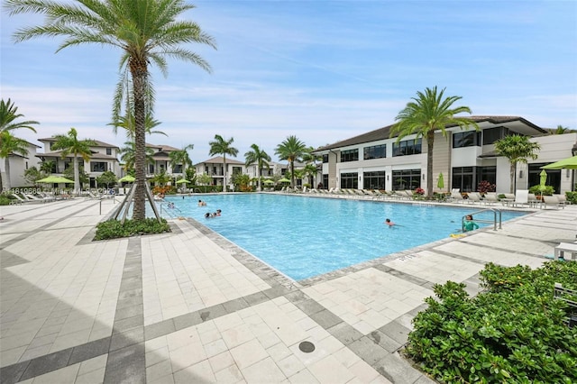 8167 NW 41st St Unit E-406, Doral, FL 33166 - community pool with a residential view and a patio