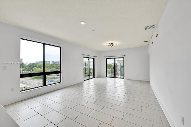 8167 NW 41st St Unit E-406, Doral, FL 33166 - unfurnished room featuring baseboards