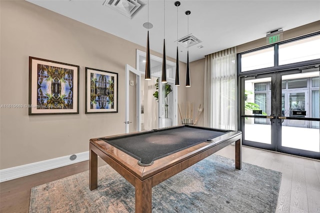 8167 NW 41st St Unit E-406, Doral, FL 33166 - playroom featuring french doors, wood finished floors, billiards, and healthy amount of natural light