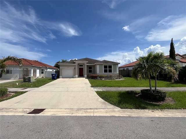 15924 SW 306th Ter, Homestead, FL 33033 - view of front of home with driveway, a garage, and stucco siding