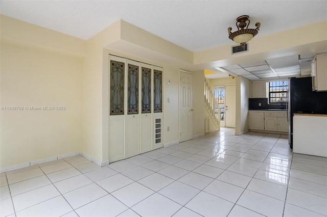 5808 W 26th Ave Unit 211, Hialeah, FL 33016 - unfurnished room featuring light tile patterned flooring