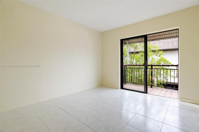 5808 W 26th Ave Unit 211, Hialeah, FL 33016 - empty room with light tile patterned floors