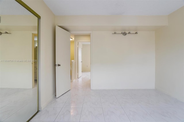 5808 W 26th Ave Unit 211, Hialeah, FL 33016 - empty room with baseboards