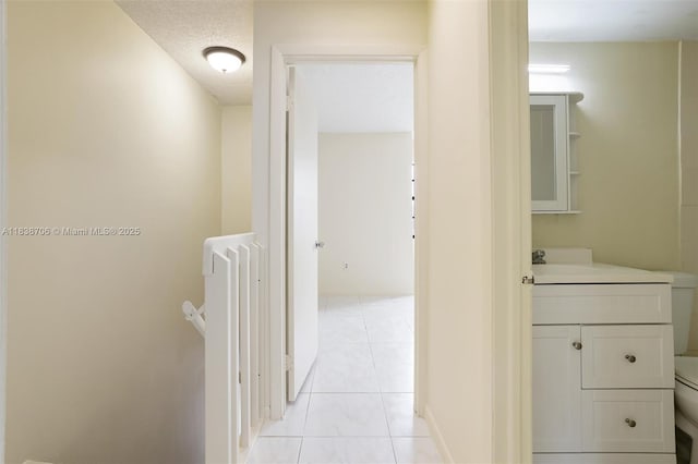 5808 W 26th Ave Unit 211, Hialeah, FL 33016 - corridor with a sink and light tile patterned floors