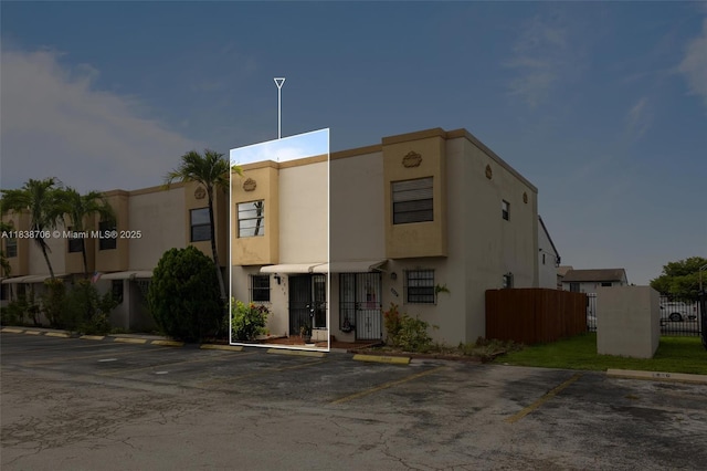 5808 W 26th Ave Unit 211, Hialeah, FL 33016 - view of property featuring uncovered parking