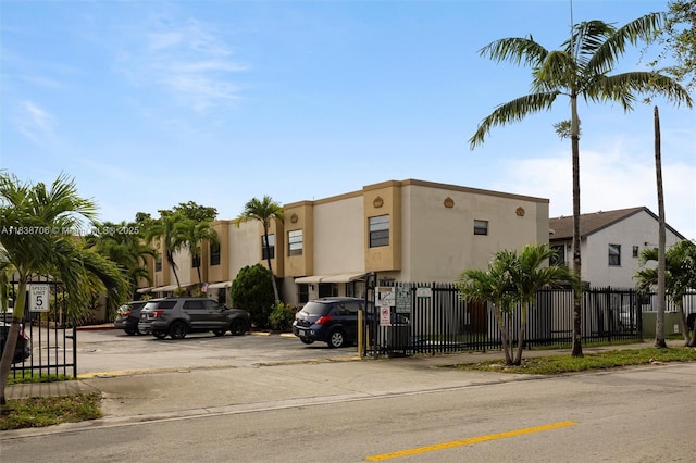 5808 W 26th Ave Unit 211, Hialeah, FL 33016 - view of building exterior with uncovered parking