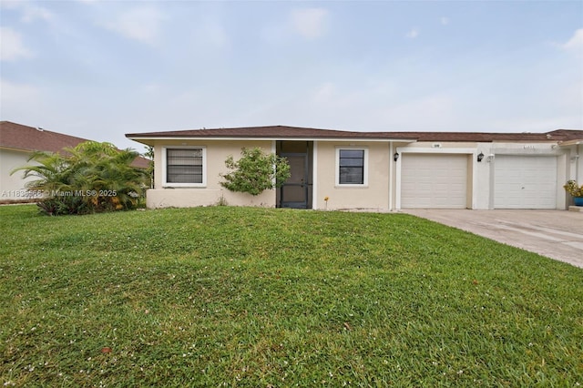 1600 Granfern Ave, West Palm Beach, FL 33415 - ranch-style house with a garage, stucco siding, concrete driveway, and a front yard