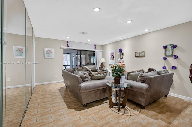1600 Granfern Ave, West Palm Beach, FL 33415 - living area with light wood finished floors and recessed lighting