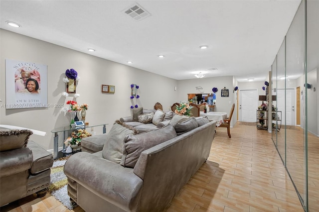 1600 Granfern Ave, West Palm Beach, FL 33415 - living room with recessed lighting and light wood-type flooring