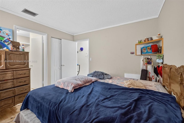 1600 Granfern Ave, West Palm Beach, FL 33415 - bedroom with a textured ceiling and ornamental molding