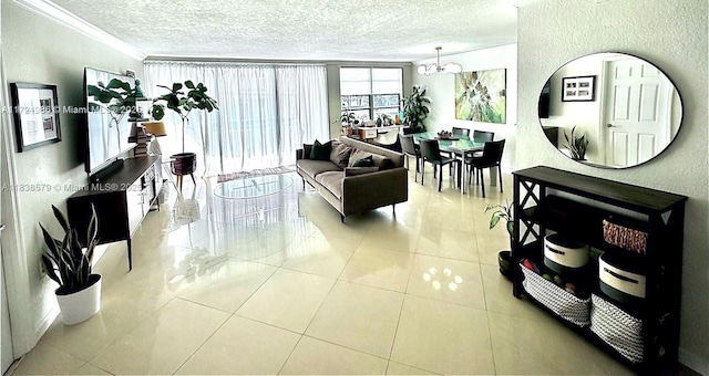1080 94th St Unit 212, Bay Harbor Islands, FL 33154 - living area featuring a textured ceiling, crown molding, a chandelier, tile patterned flooring, and a textured wall