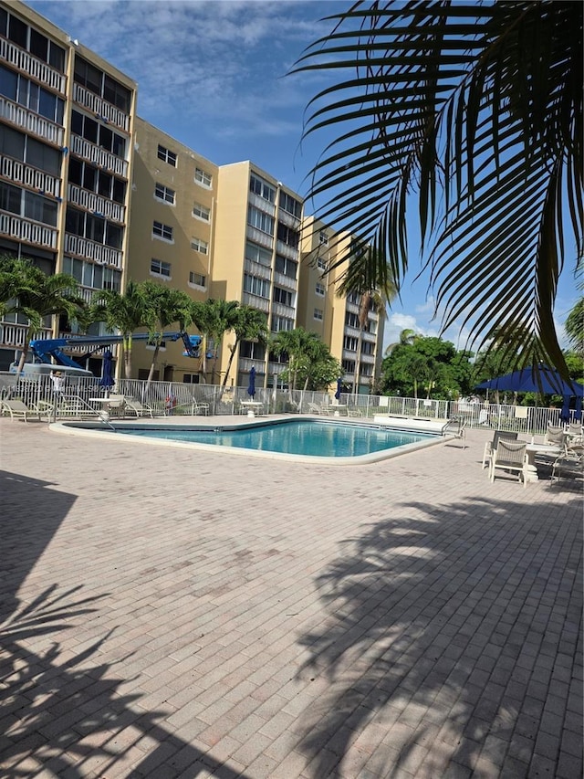 620 NE 12th Ave Unit 101, Hallandale Beach, FL 33009 - community pool with a patio